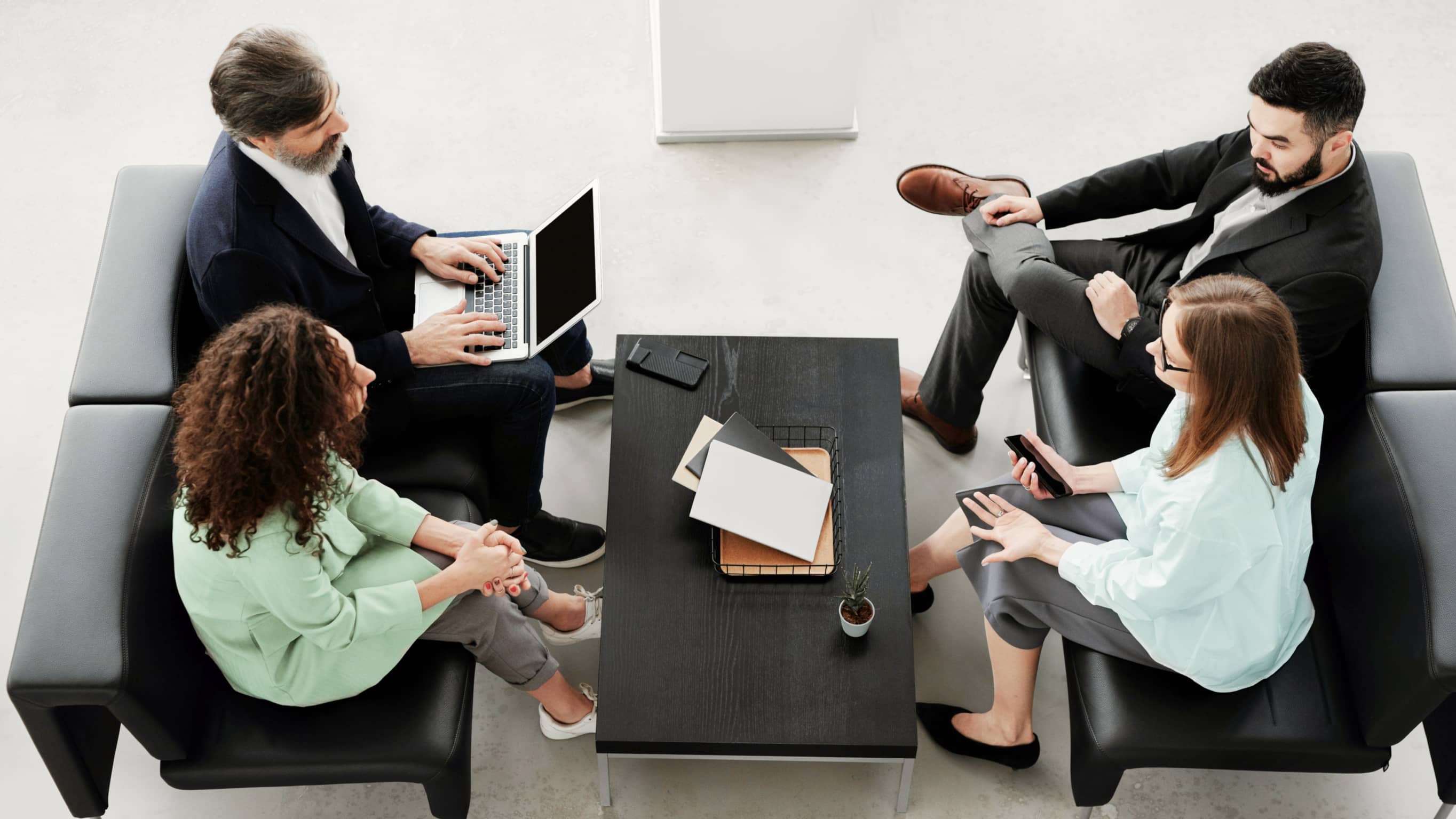 Four People Work Meeting - Accountant X Webflow Template